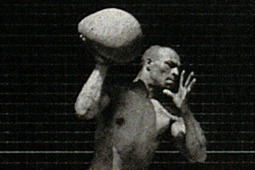 Man Throwing Boulder down