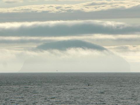 A Solitary Island Out in the Ocean Fog