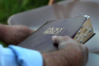 Holding the Bible